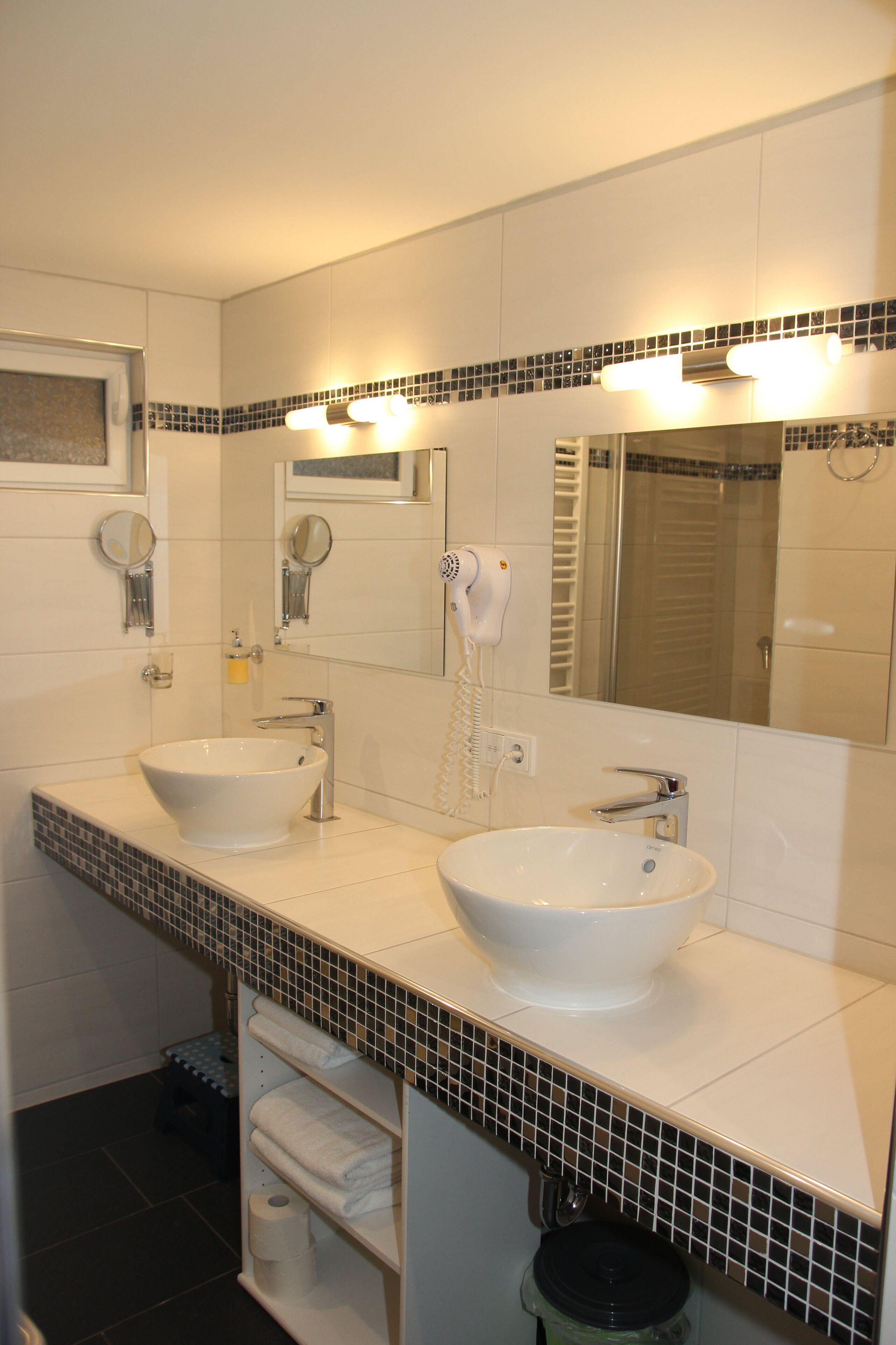 junior suite | bathroom | shower, hair dryer, towels