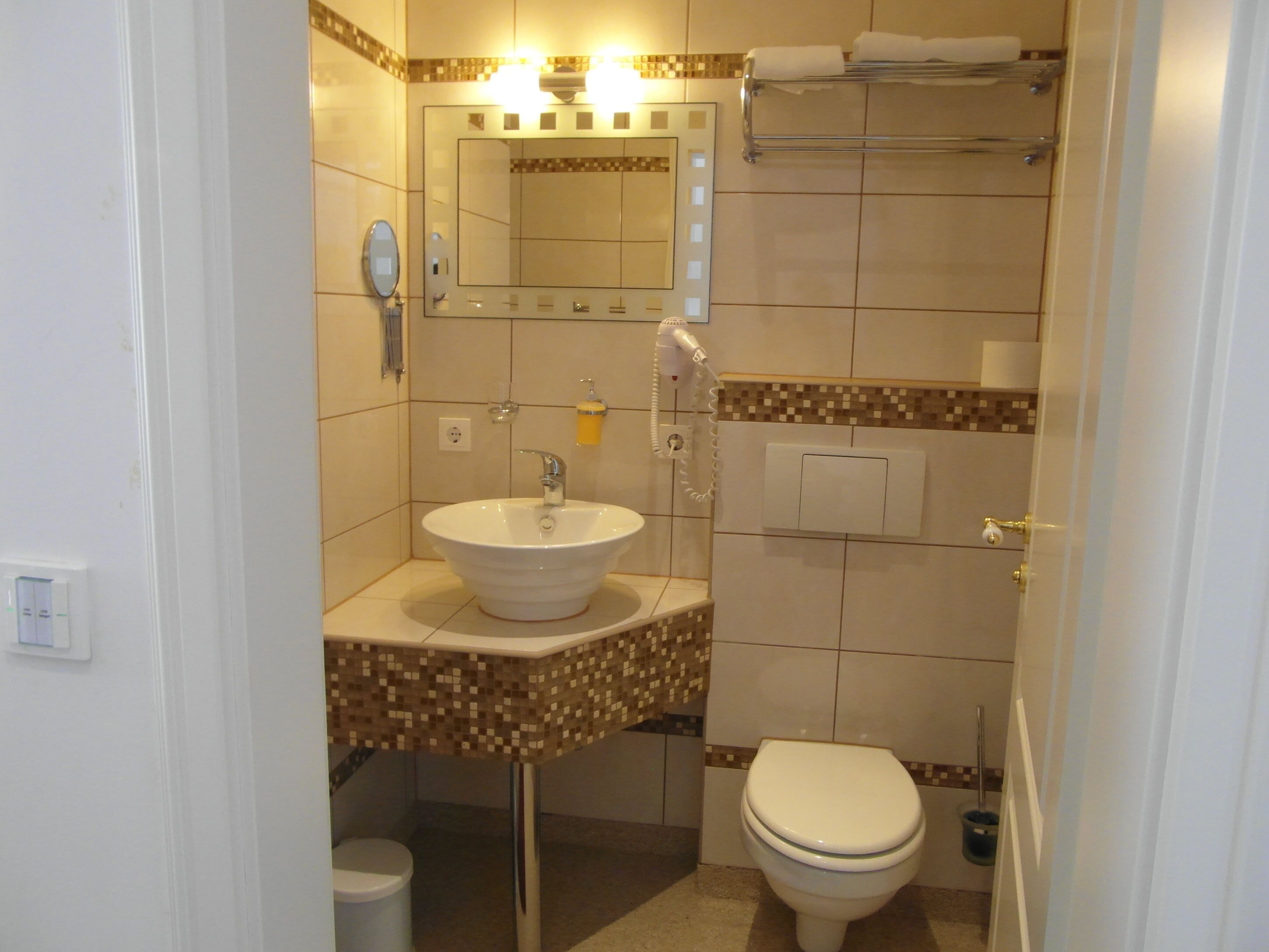standard double room | bathroom | shower, hair dryer, towels