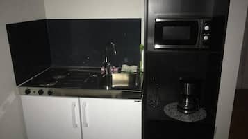Fridge, microwave, stovetop, cookware/dishes/utensils