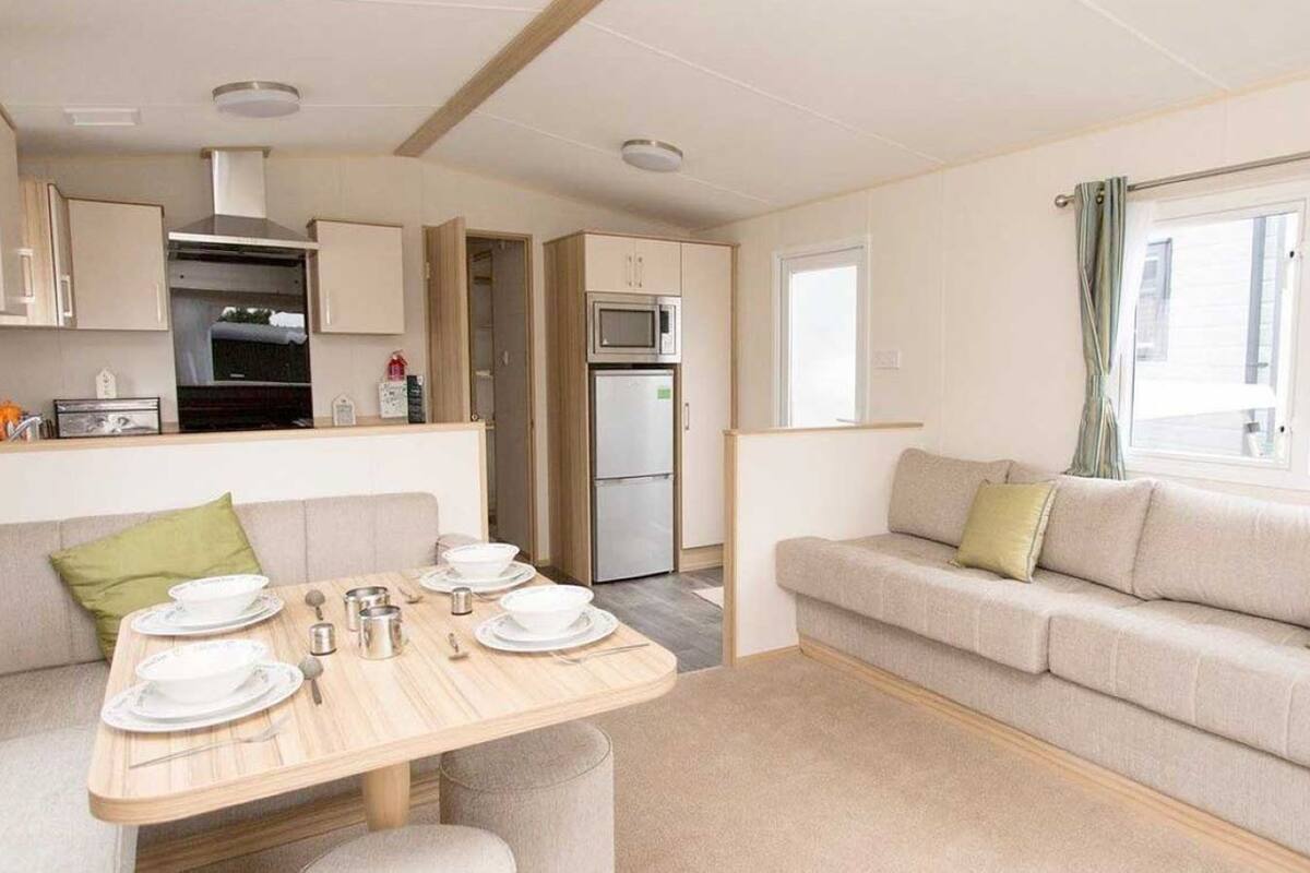 Kamar Comfort | Area keluarga | TV layar datar