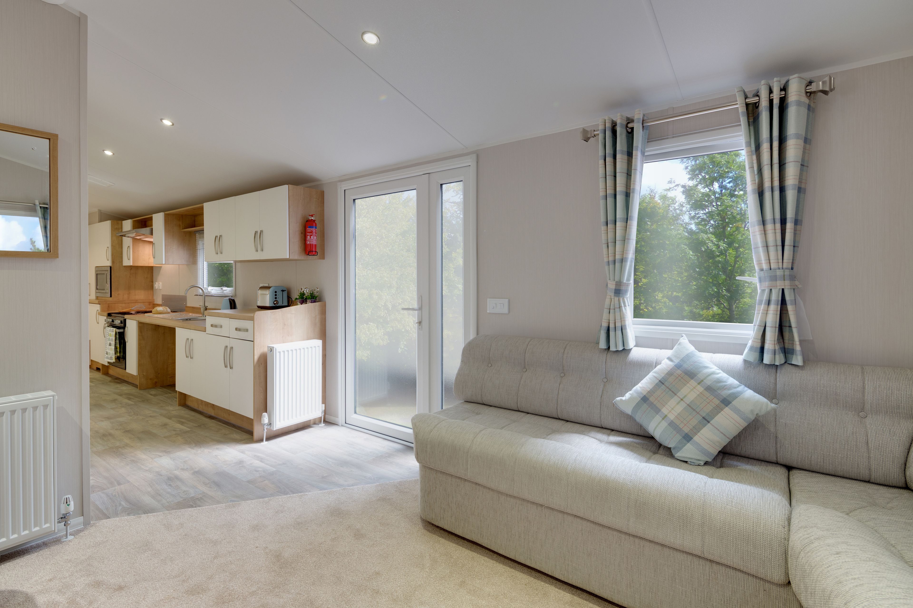 premium 2, accessible caravan | living area | flat-screen tv
