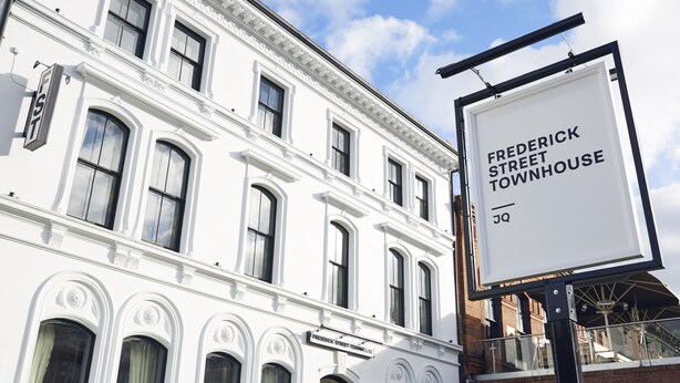 A white building with a sign that reads "Frederick Street Townhouse." - Frederick Street Townhouse (Birmingham)