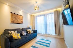 Waterlane Island Deluxe 3 | Ruang tamu | TV skrin rata
