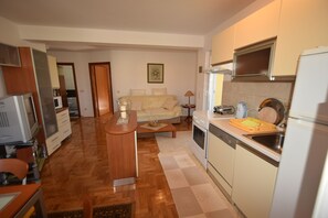 Apartment, 2 Bedrooms | Living area | TV