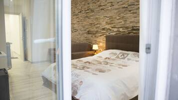 Camera familiare (San Pietro) | Minibar, con stile personalizzato, tende oscuranti, insonorizzazione