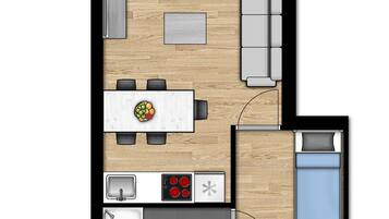 Distribución de un apartamento de dos dormitorios con cocina, comedor y una sala de estar pequeña.