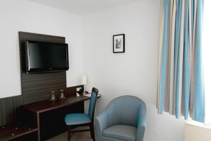 Desk, blackout drapes, rollaway beds, free WiFi