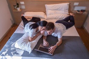 Premium bedding, down comforters, in-room safe, soundproofing