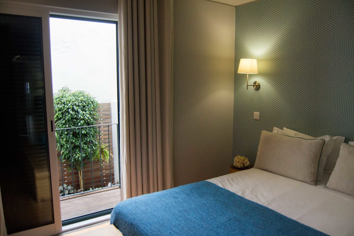 Standard Apartment, 1 Bedroom, Patio | 1 bedroom, blackout drapes, soundproofing, free WiFi