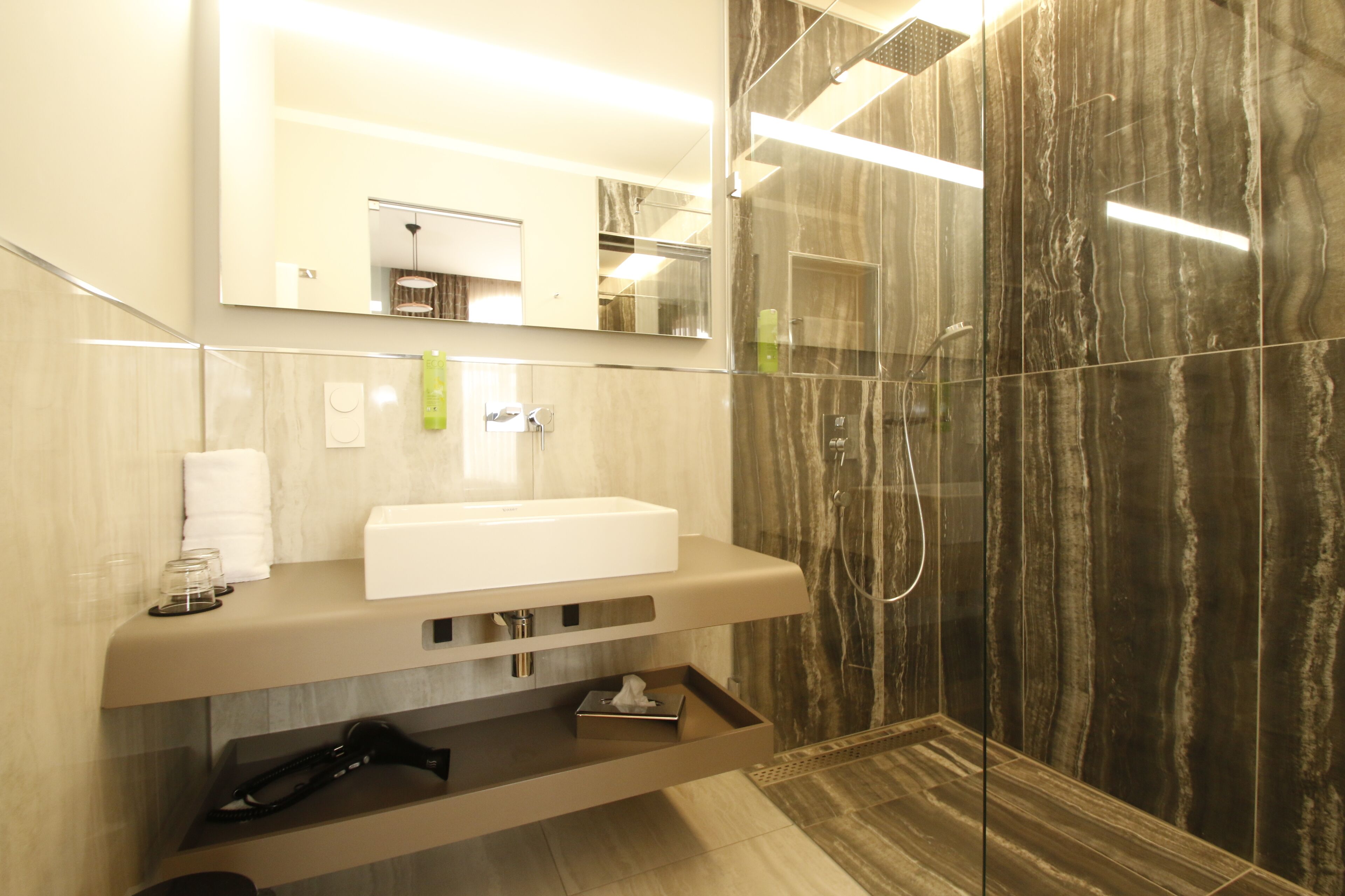 shower, bathrobes, slippers, towels