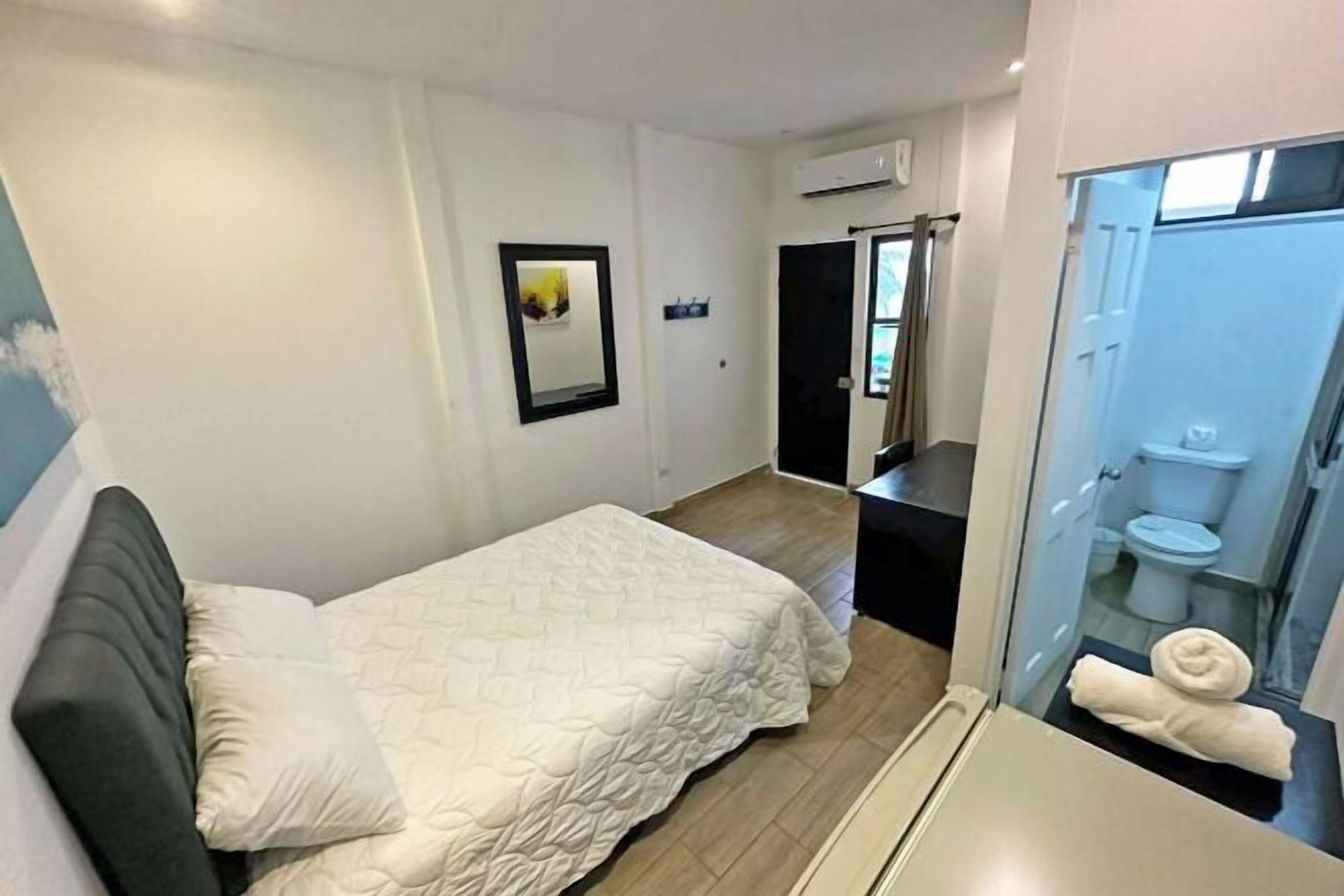 Premium bedding, down comforters, pillowtop beds, minibar