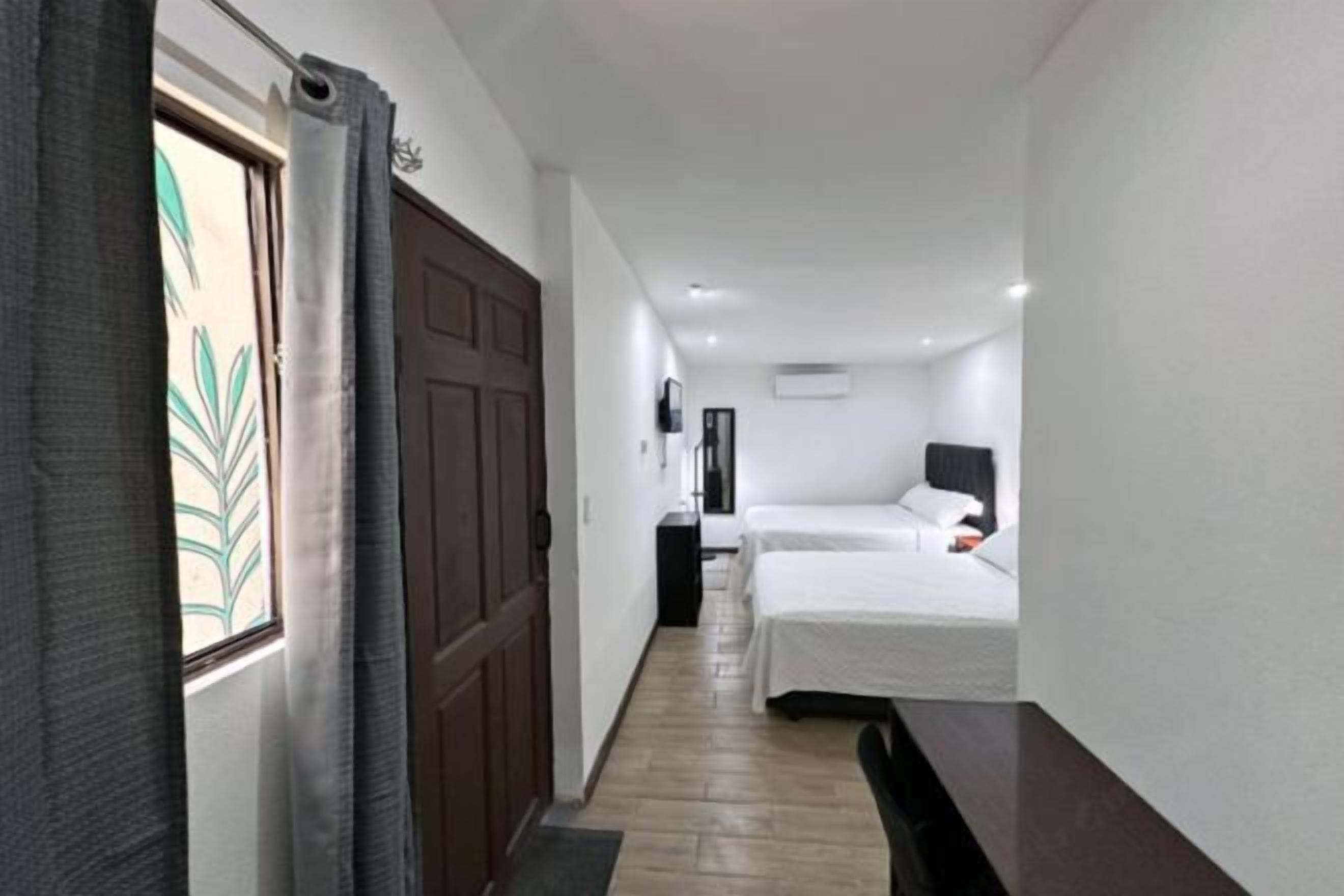 Premium bedding, down comforters, pillowtop beds, minibar