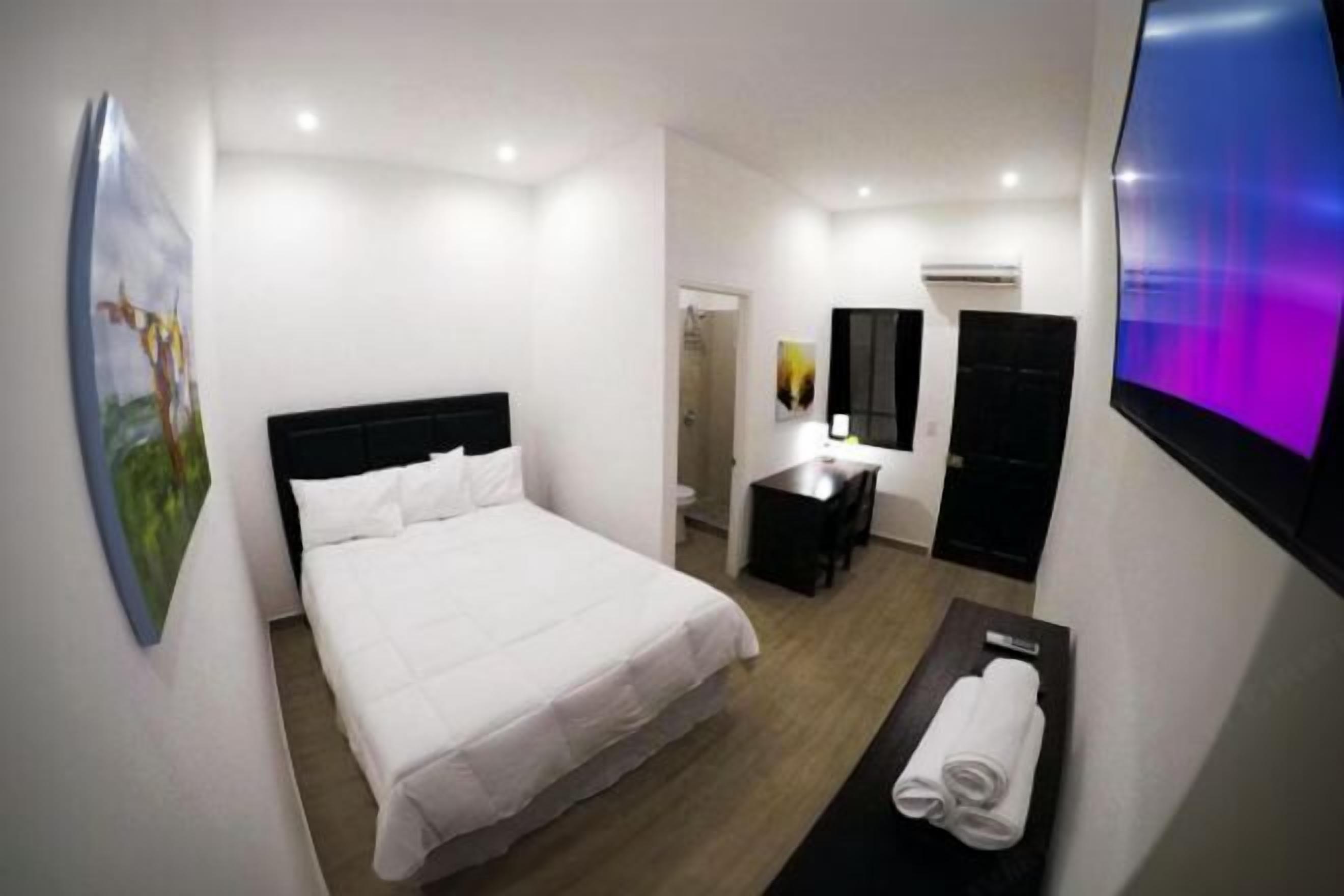 Premium bedding, down comforters, pillowtop beds, minibar