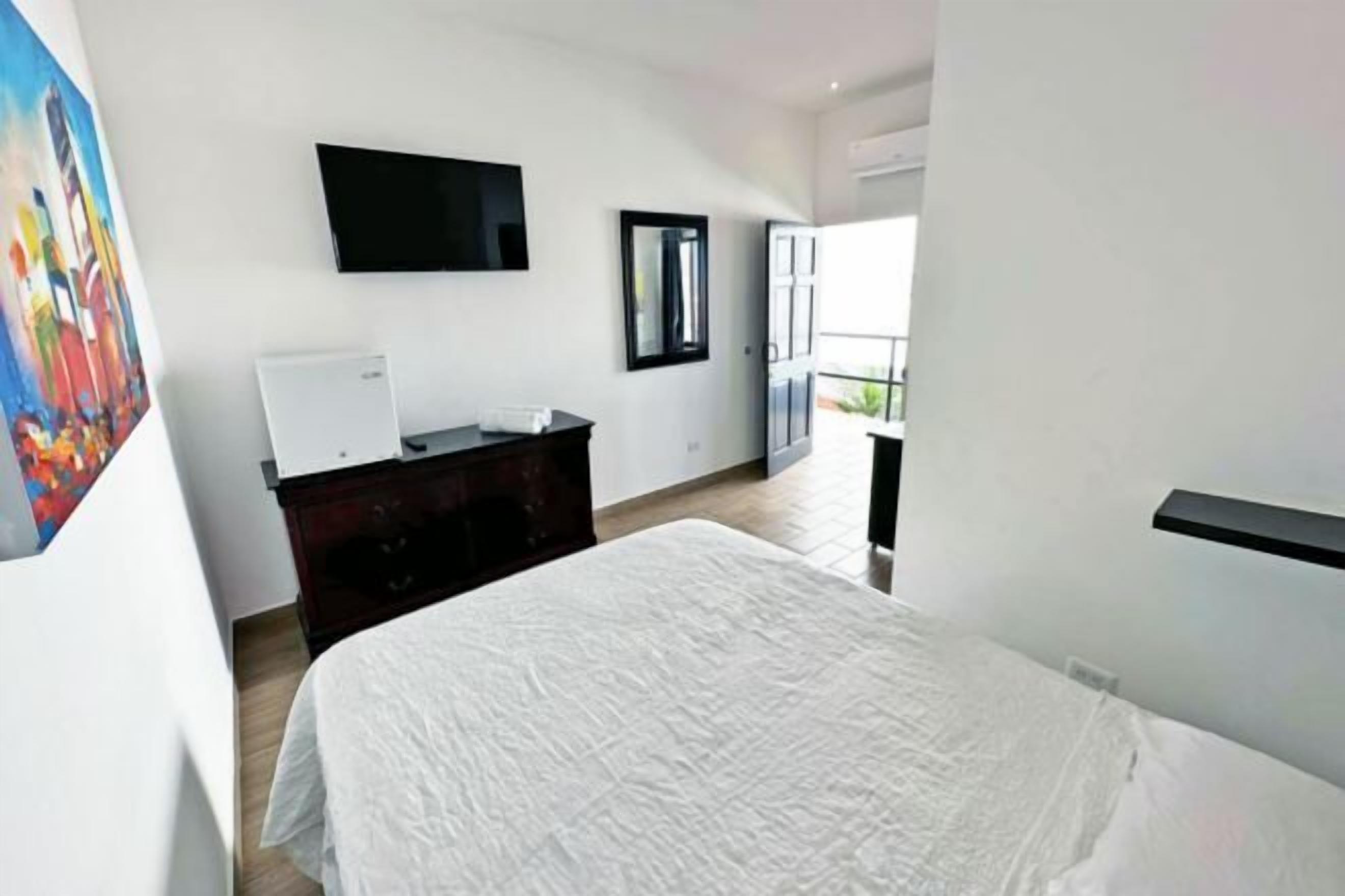 Premium bedding, down comforters, pillowtop beds, minibar