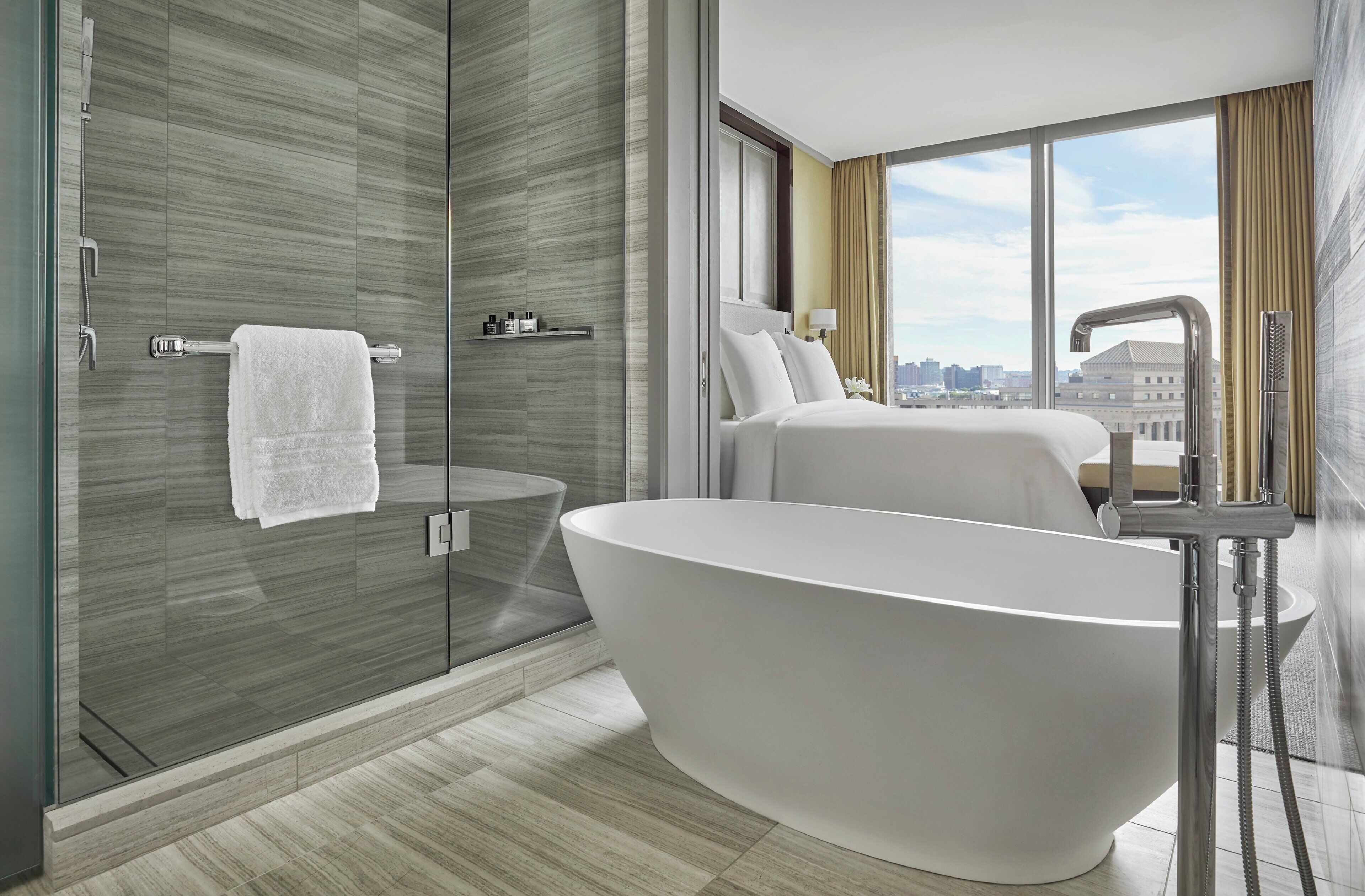 executive suite | bathroom | designer toiletries, hair dryer, bathrobes, slippers