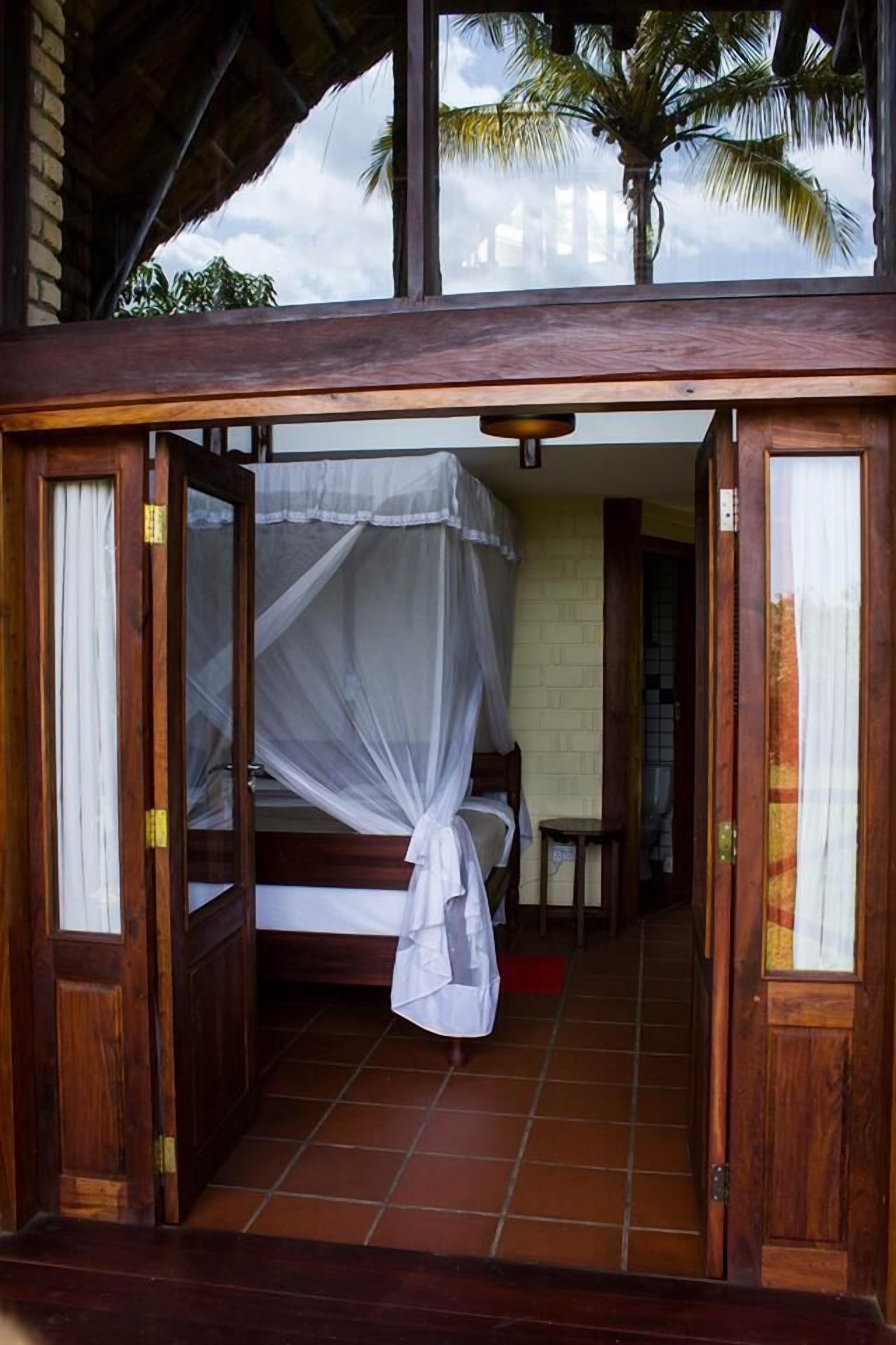 Deluxe Chalet, Multiple Beds, Non Smoking, Mountain View | Living area | 40-cm TV with satellite channels