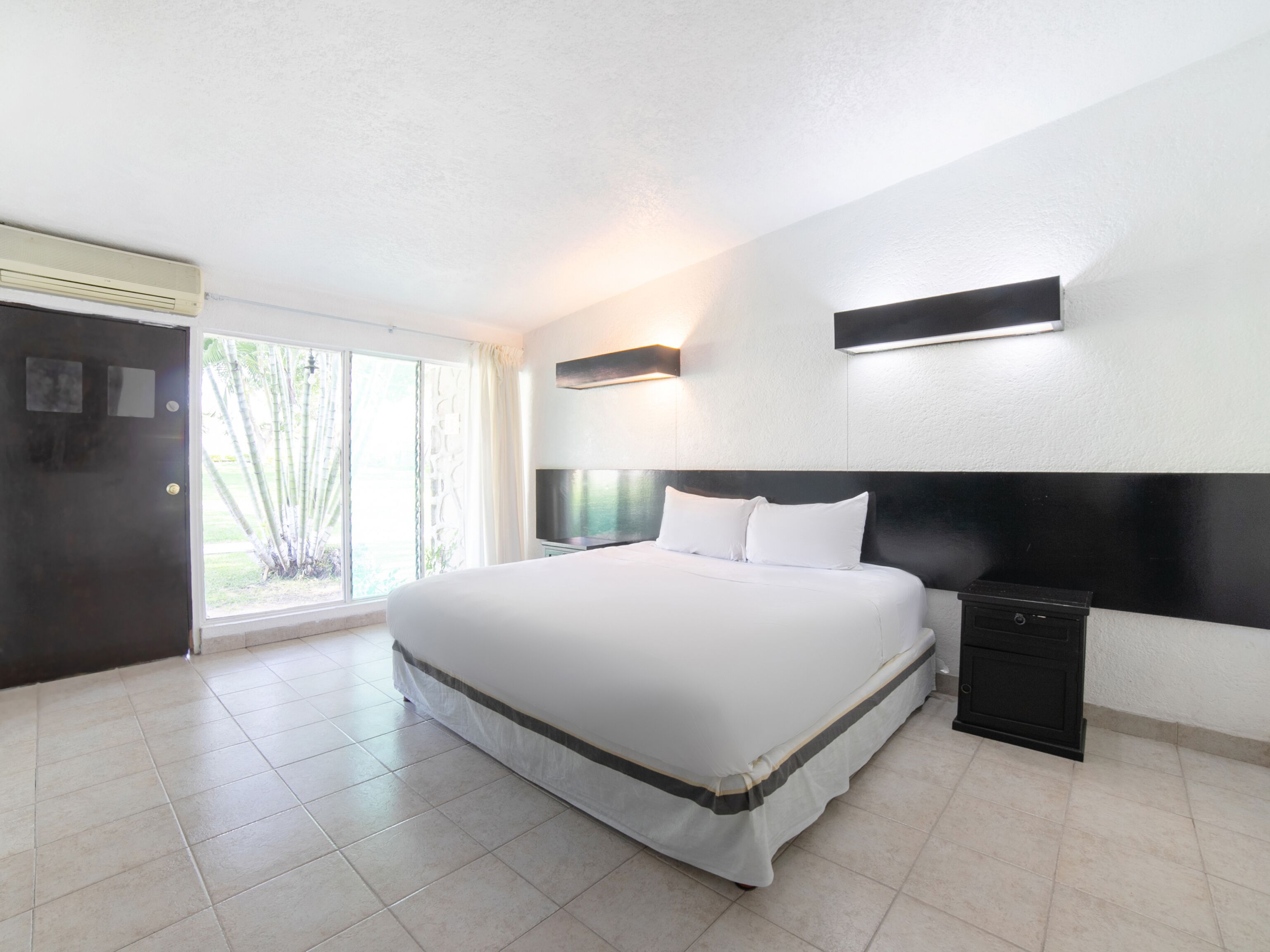 desk, iron/ironing board, bed sheets