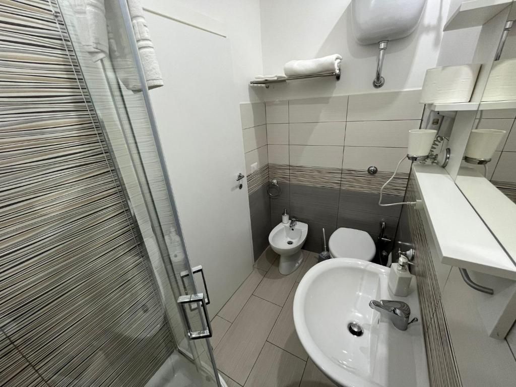 Foto - F Rooms