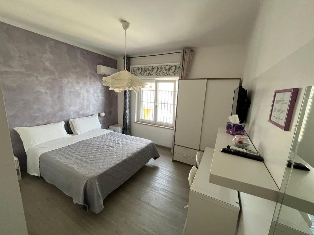 Foto - F Rooms