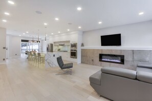 Luxury Townhome, Non Smoking | Living room | 55-inch flat-screen TV with cable channels, Smart TV, fireplace - New Luxury Townhome 23 (Edmonton)