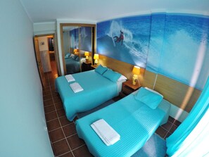 Family Triple Room, Shared Bathroom | Free WiFi, bed sheets