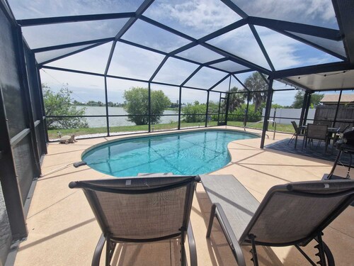 House with solar heated pool and lake view!