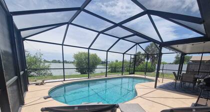 House with solar heated pool and lake view!