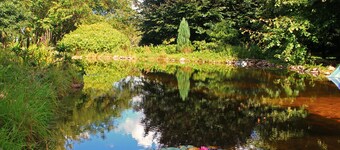 Holiday house with a private swimming pool and sauna in a rural idyll