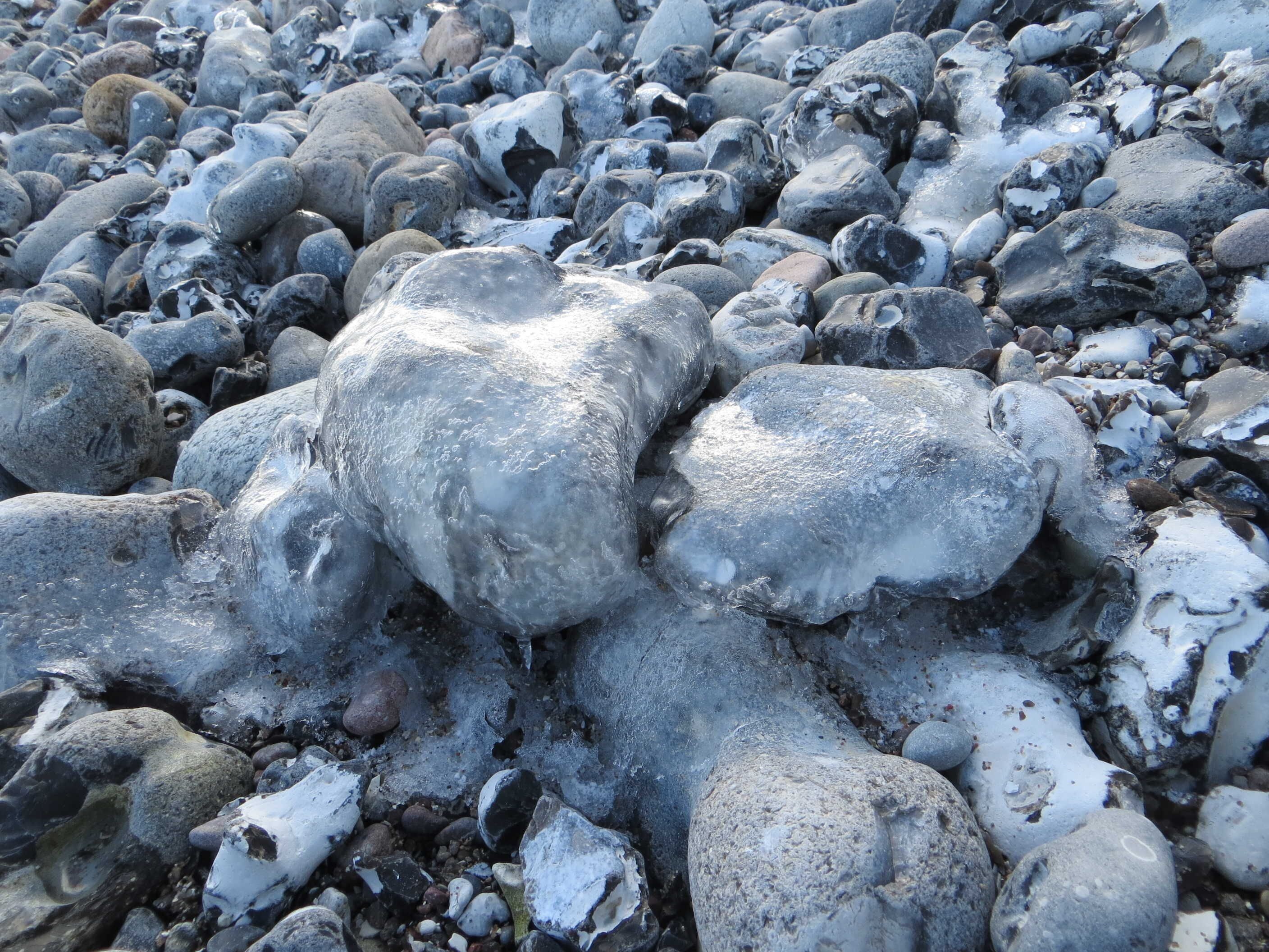 A collection of rocks with some ice formations.