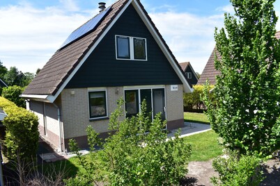 Comfortable holiday home near the beach with garden, with playground and pool