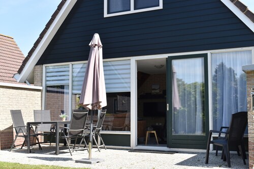 Comfortable holiday home near the beach with garden, with playground and pool