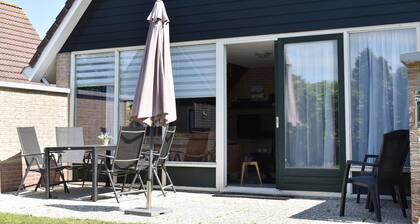 Comfortable holiday home near the beach with garden, with playground and pool