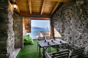Outdoor dining - Il Melo by Theater Home, with marvellous lake view (Tignale)