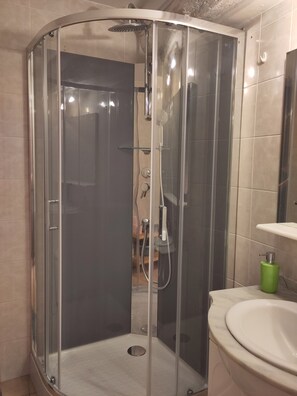Hair dryer, towels, soap, shampoo