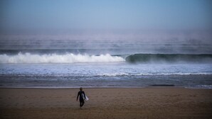 A beach with a person walking towards the ocean. - Contemporary villa -Exceptional view of the dune-Private pool (Soorts-Hossegor)