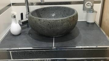 Hair dryer, towels, soap, shampoo