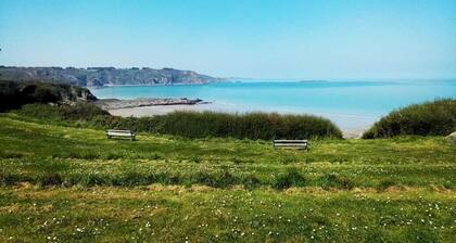 Casa revestida de madera: vista al mar 180 °