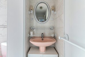 Bañera y toallas