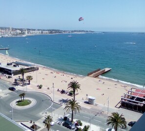 On the beach, sun-loungers