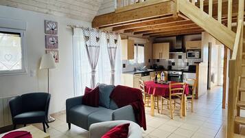 Télévision, cheminée, lecteur de DVD, chaßne hi-fi