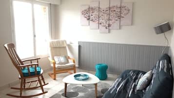 Flat-screen TV, books