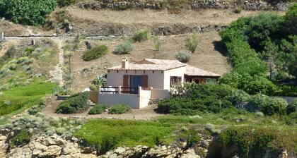 Petite maison les pieds dans l'eau