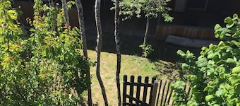 Shed with covered terrace and private garden