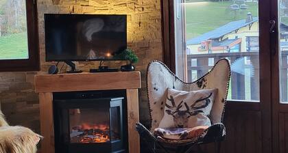 Ski in ski out, comfort & stunning views in this charming chalet-style duplex