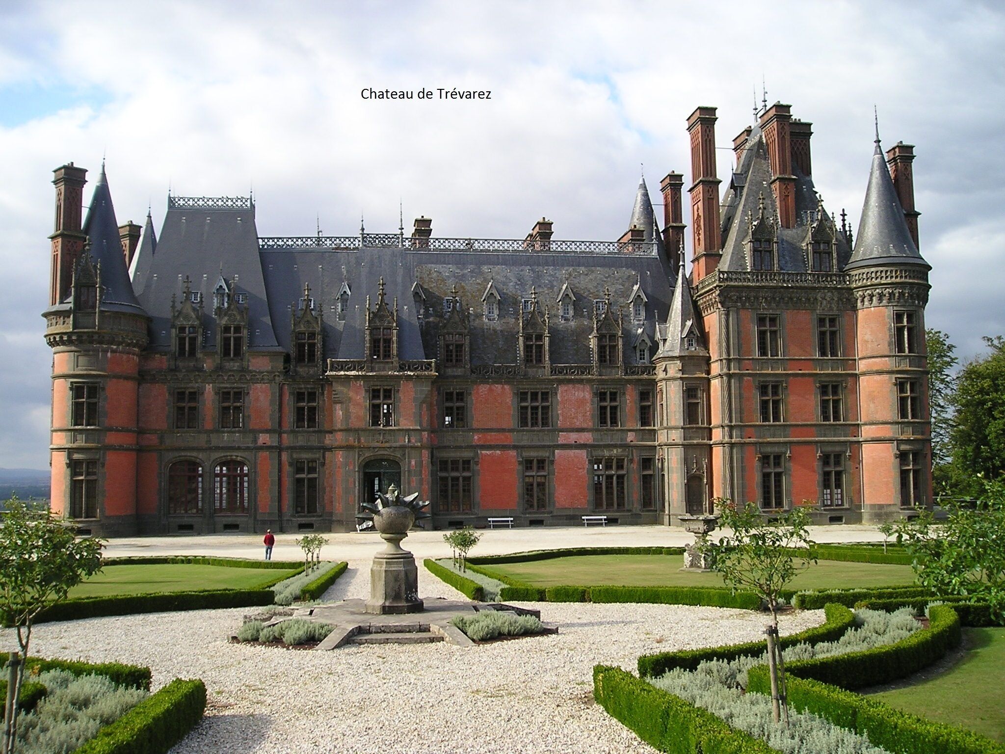 Chateau de Trévarez, a large historic building with multiple towers and a formal garden in front.