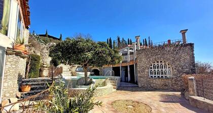 Detached stone house with swimming pool and ponds