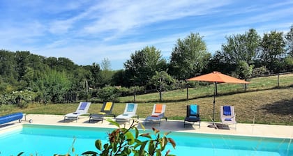 Typical touraine farm in rural surroundings with lake, woods and swimming-pool.