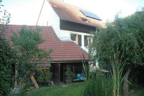 At the foot of the Vosges mountains near ski resorts and vineyards.