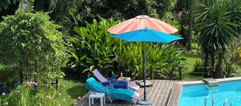 2-bedroom villa in a quiet garden with trees and flowers