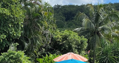2-bedroom villa in a quiet garden with trees and flowers